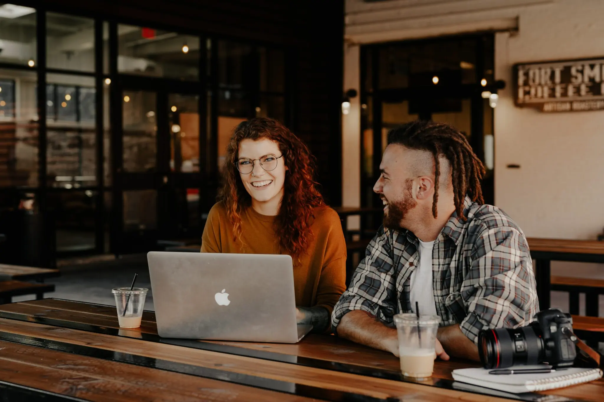 Man and woman happy at computer
