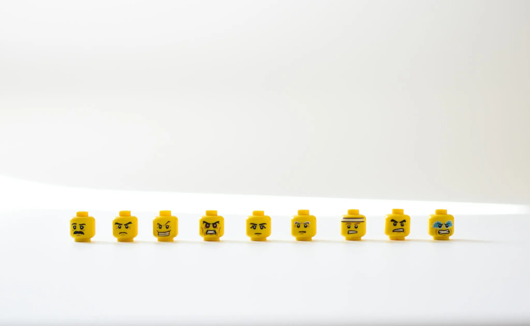 lego heads looking annoyed or angry