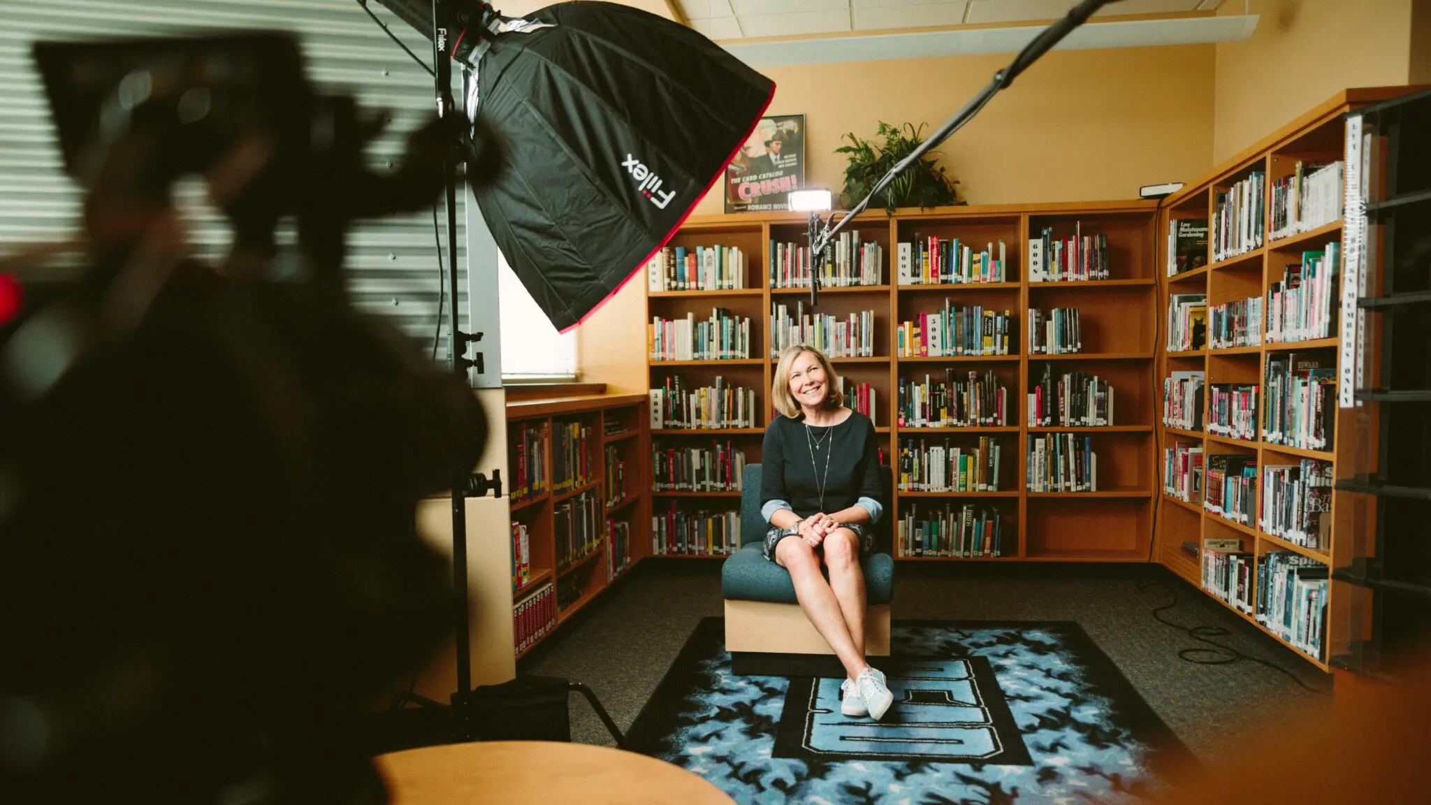 A woman being filmed for an interview