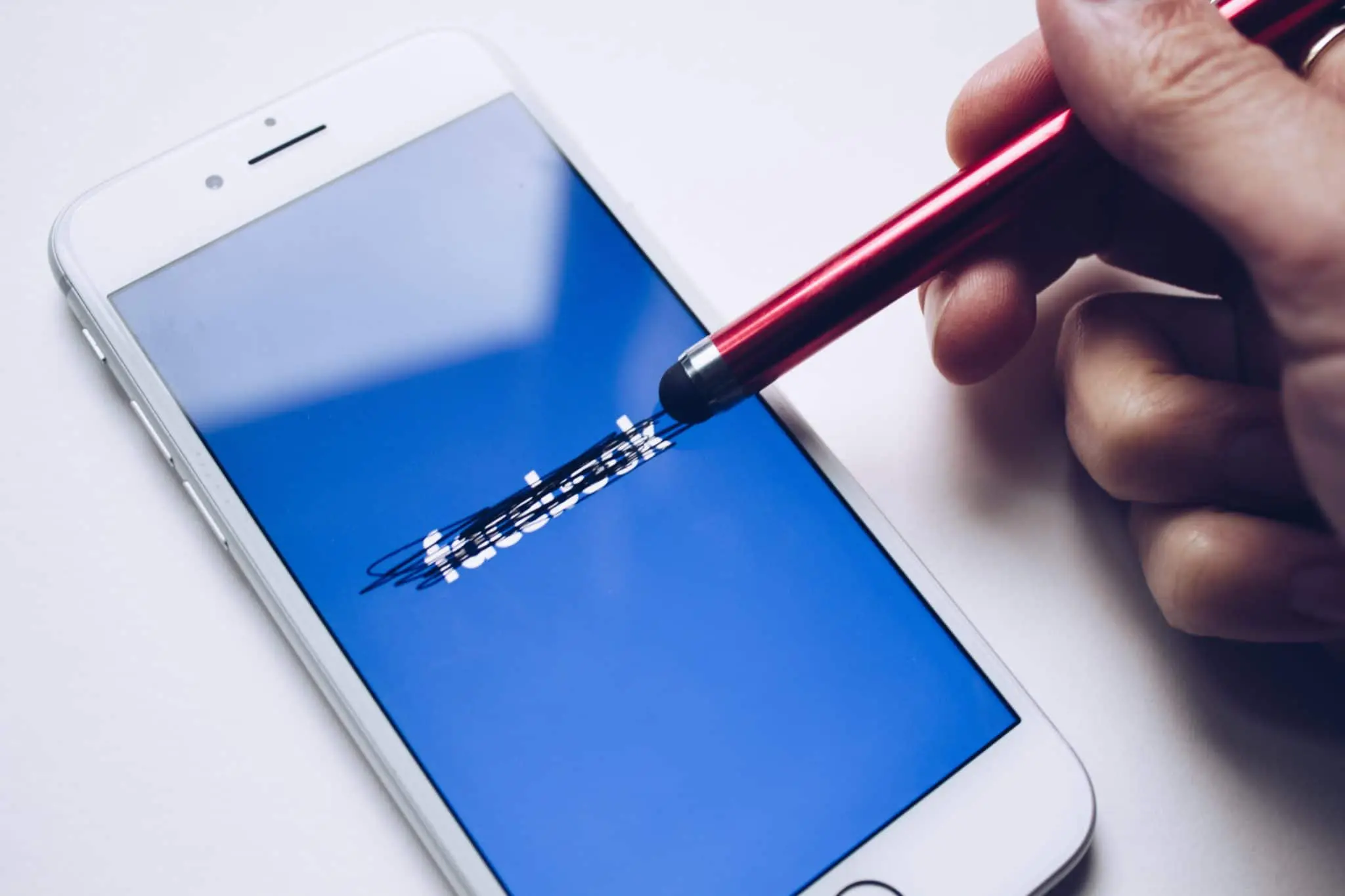 Facebook crossed out on phone screen