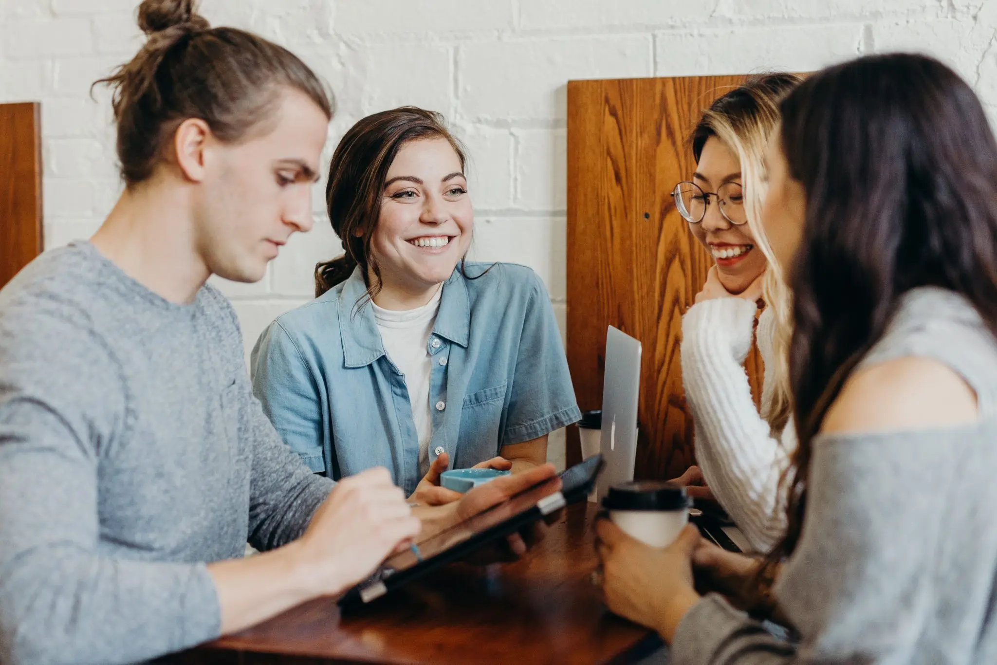 people working around table