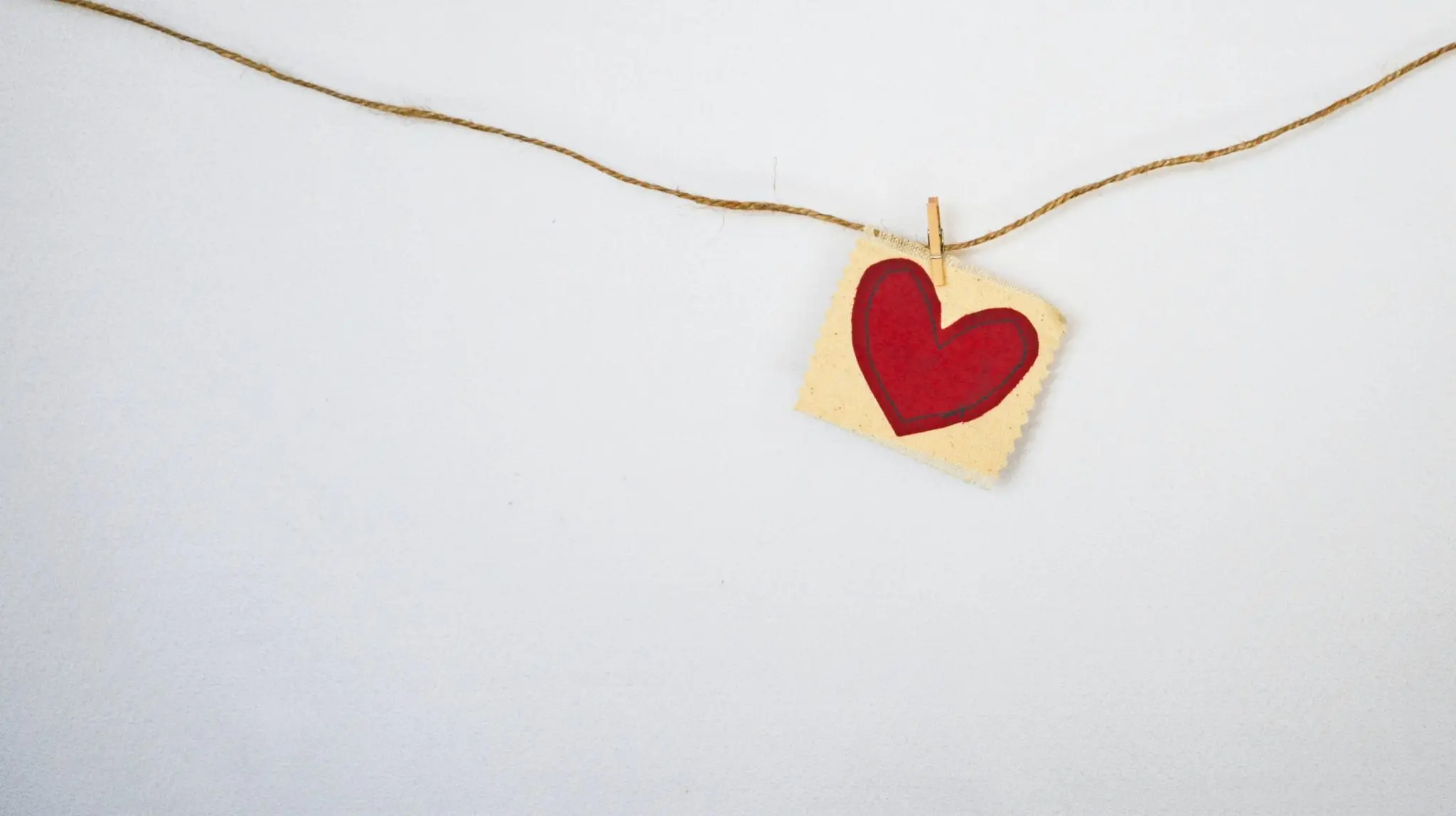 heart picture pegged to string