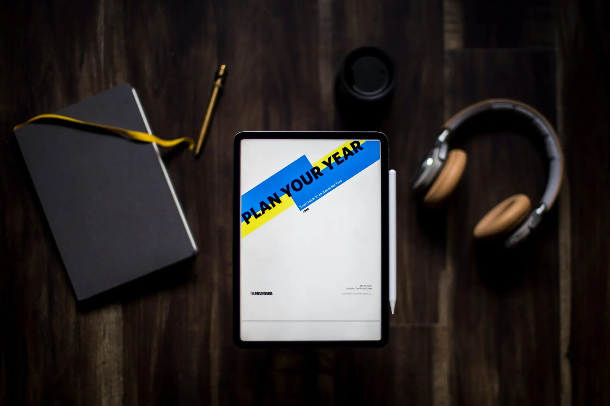 iPad on a desk with the words 'plan you year' on