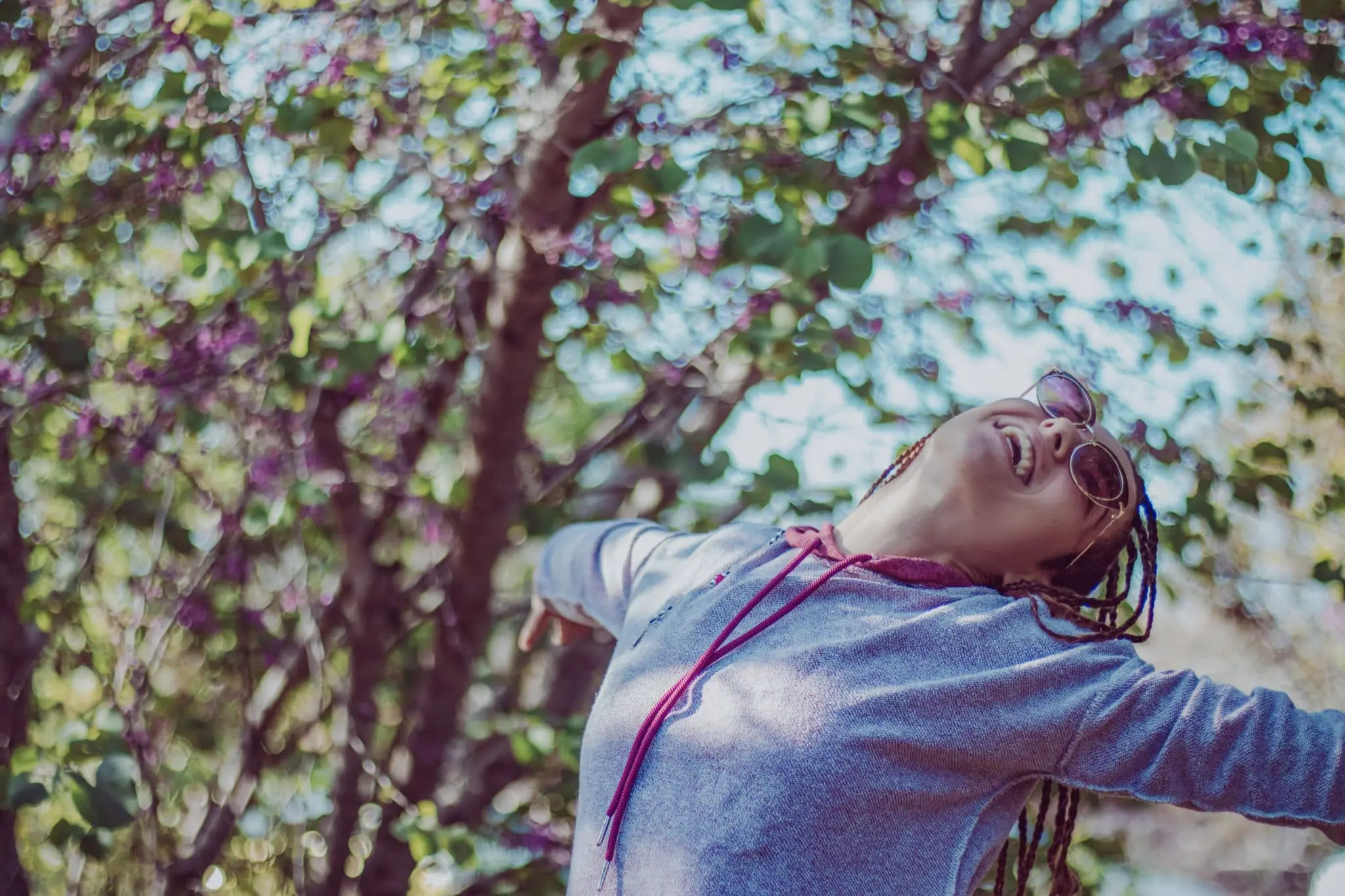 happy woman in woods