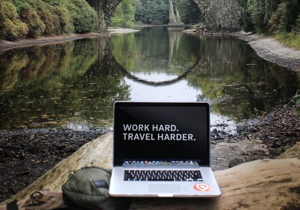 laptop by a river