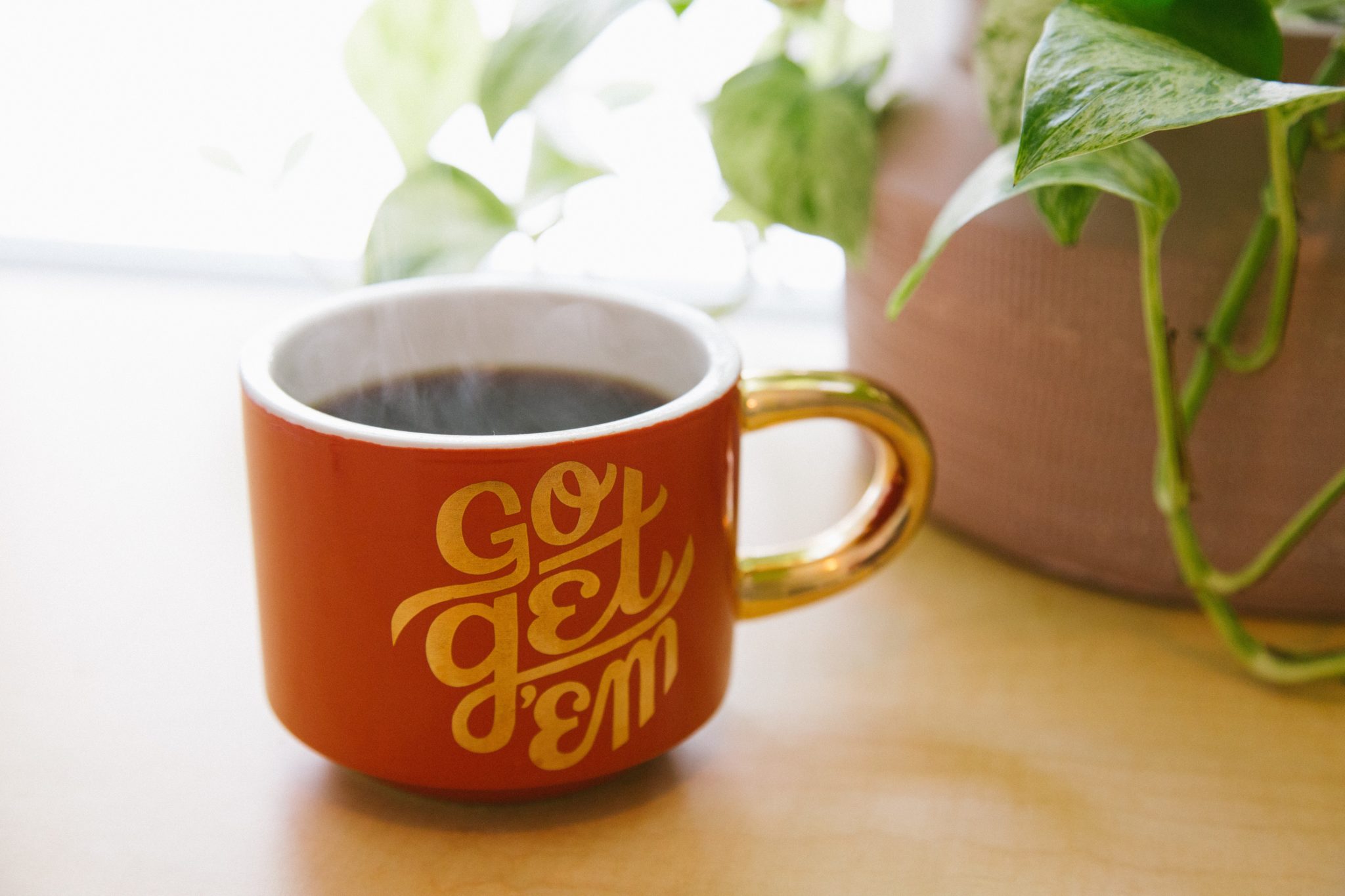 Go Get 'em mug with coffee inside