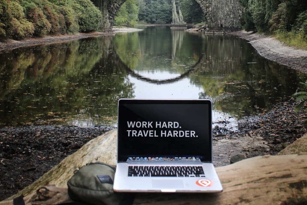 laptop by a river