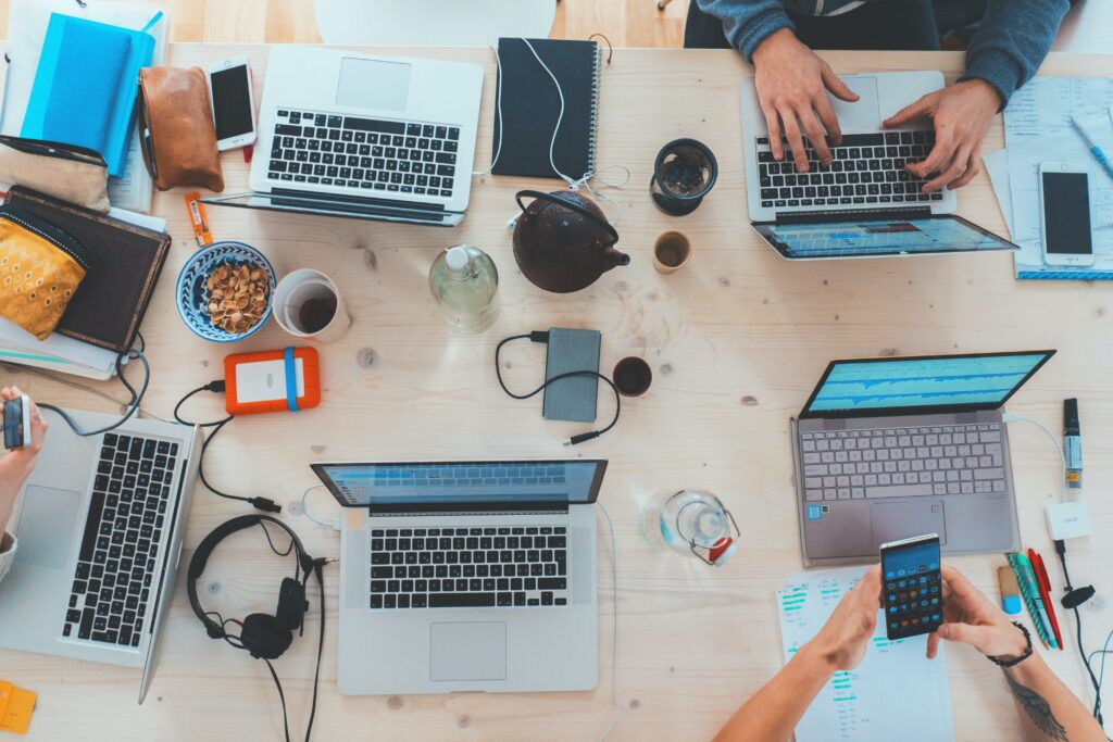 Laptops around the meeting table of an online business