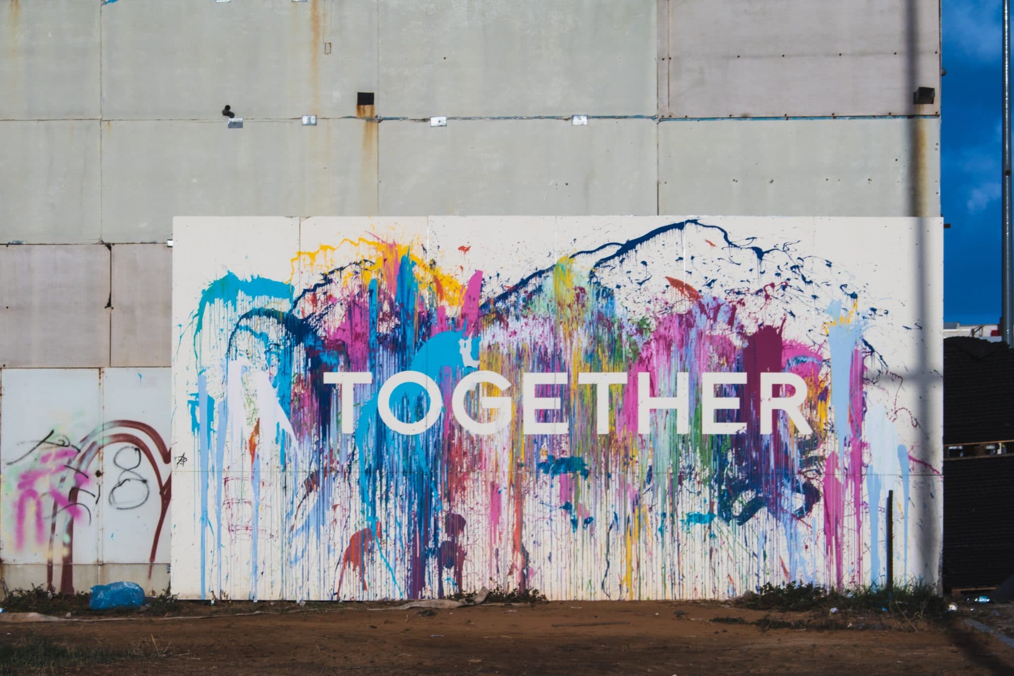 Large Painting on wall with the word Together on it