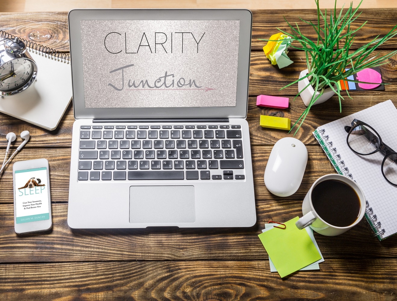 Clarity Junction Website on laptop screen on desk